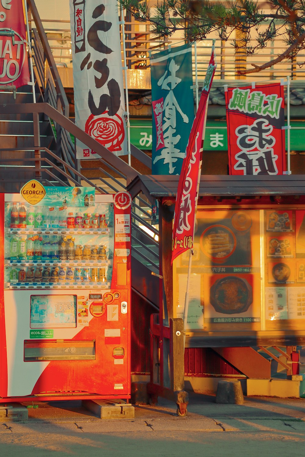 a vending machine in front of a restaurant