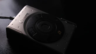 A sleek, moody frame from a luxury brand film shoot featuring cinematic lighting and a refined setting.