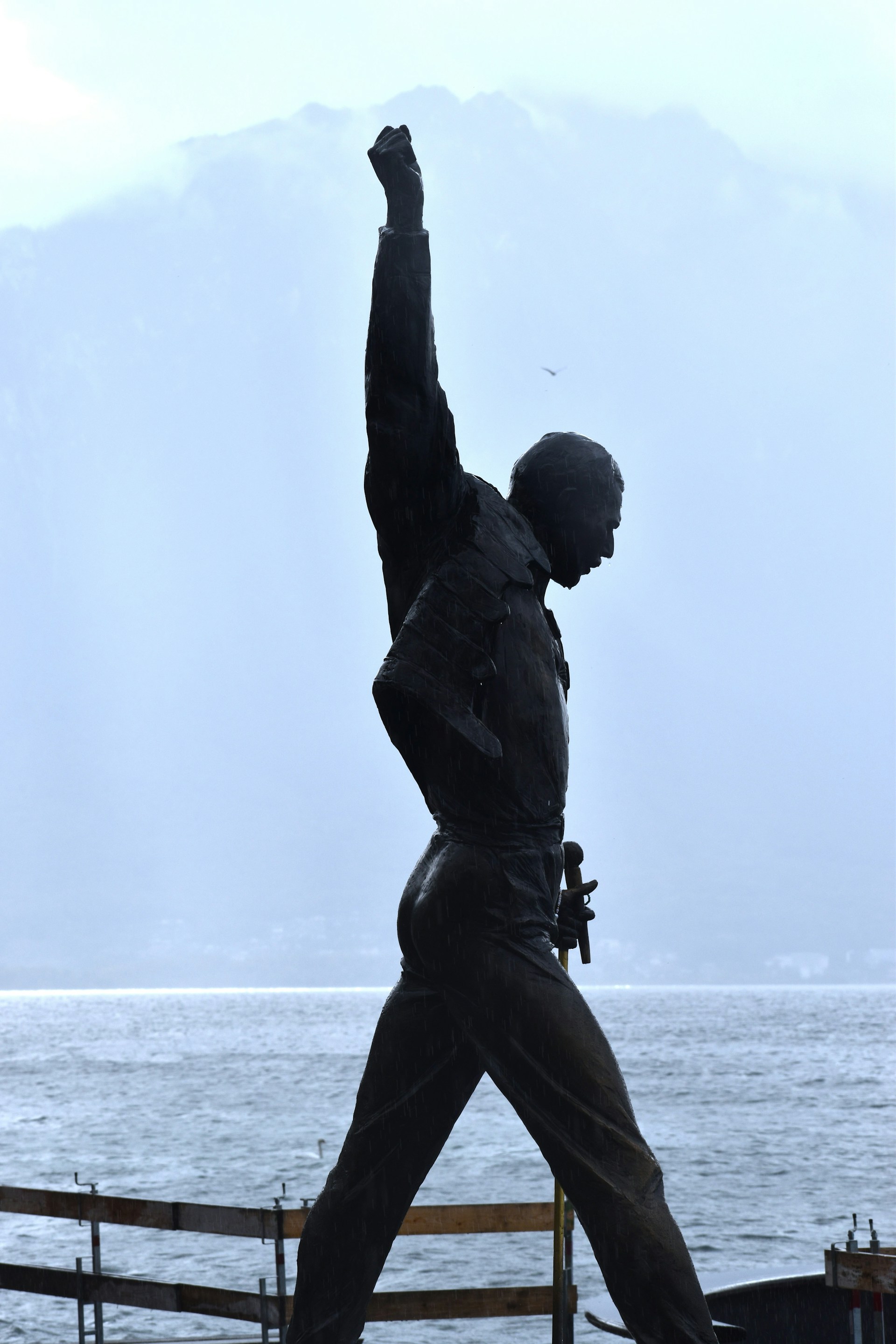 black and brown leather padded tub sofa