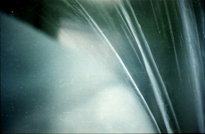 Abstract shapes in soothing blues and greens symbolizing growth and clarity.