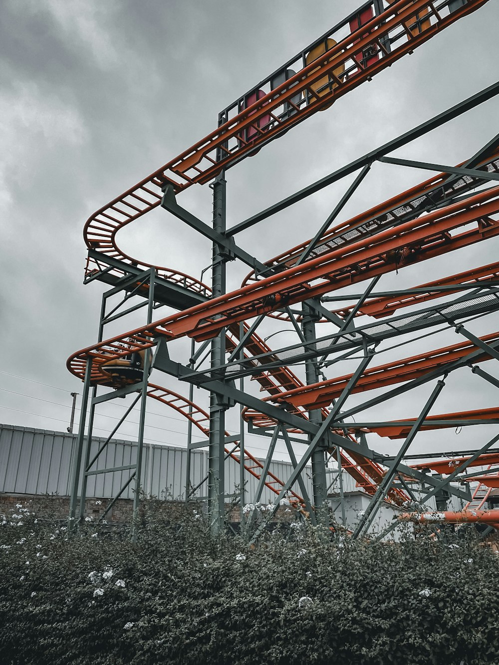 a roller coaster in the middle of a field