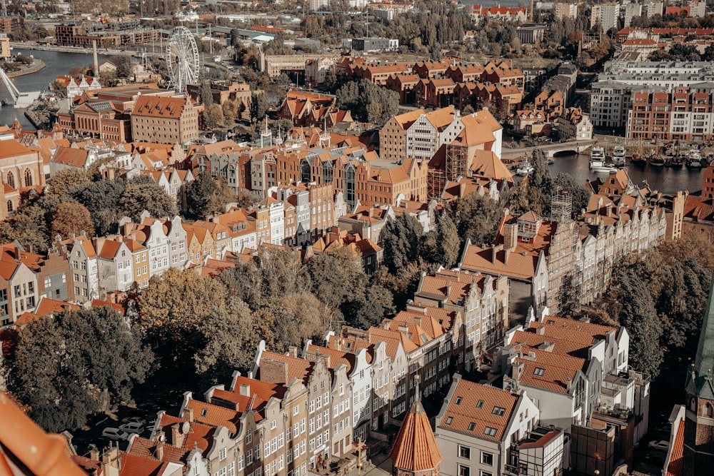 an aerial view of a city with lots of tall buildings