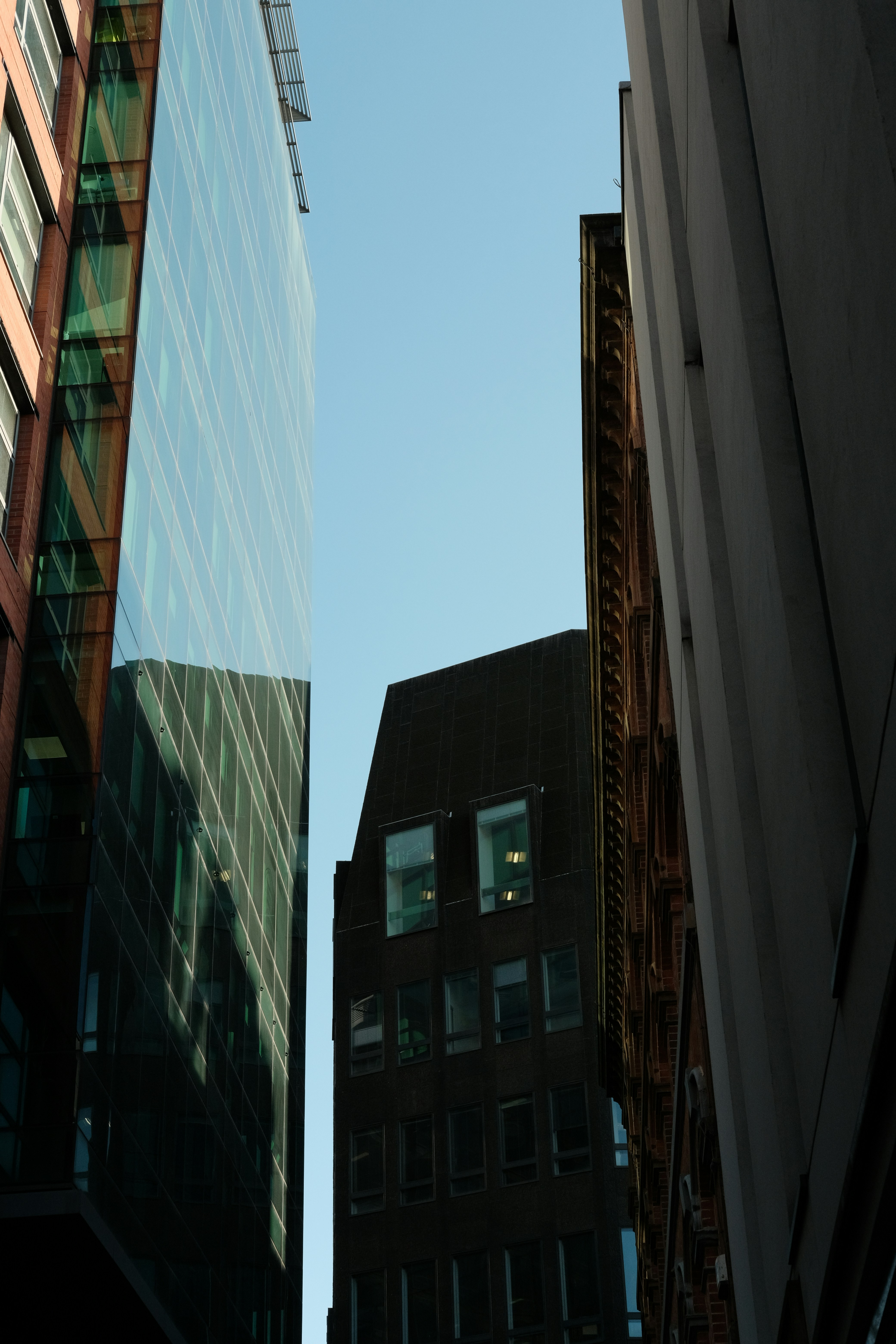 a tall building with a clock on the side of it