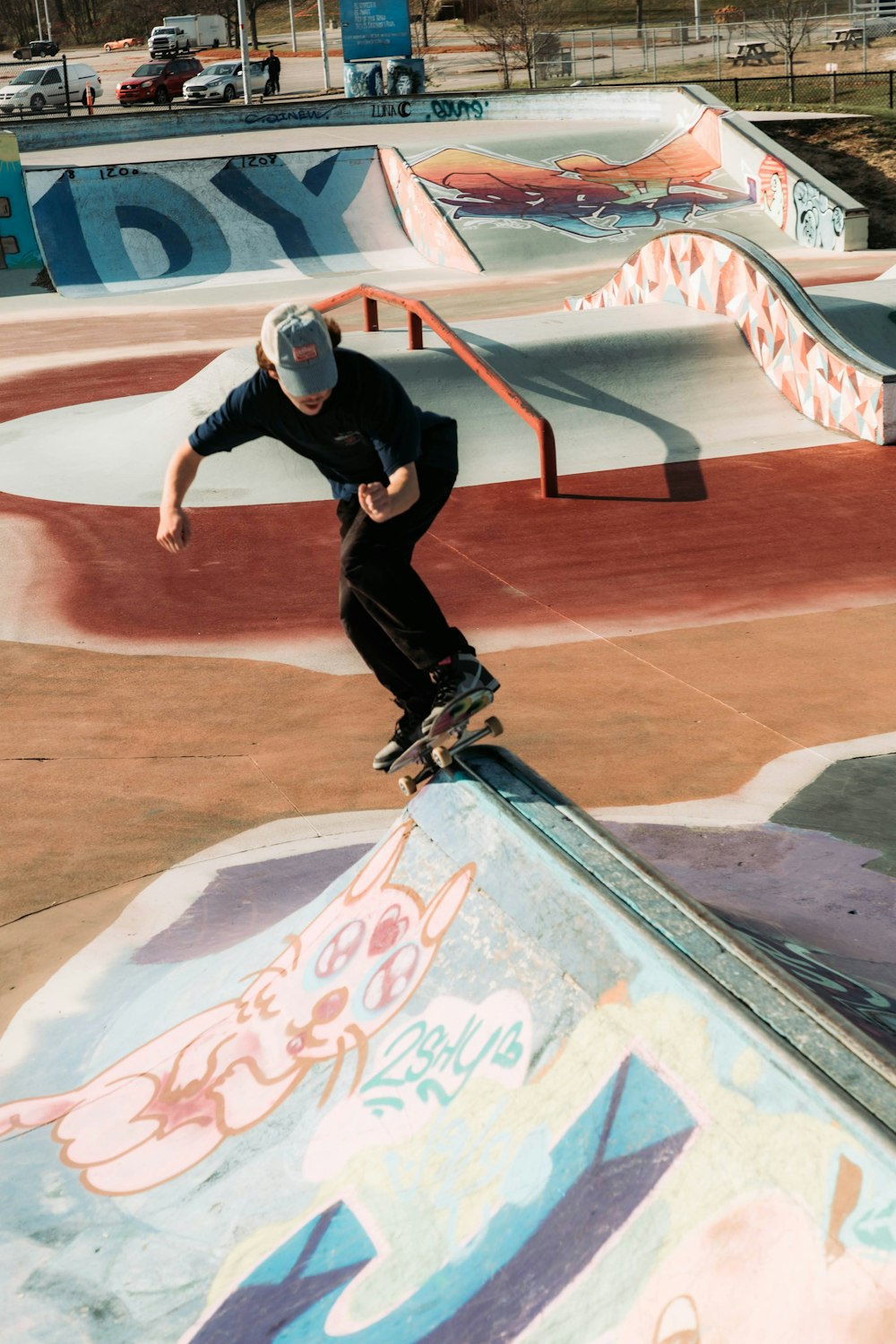 a man riding a skateboard up the side of a ramp