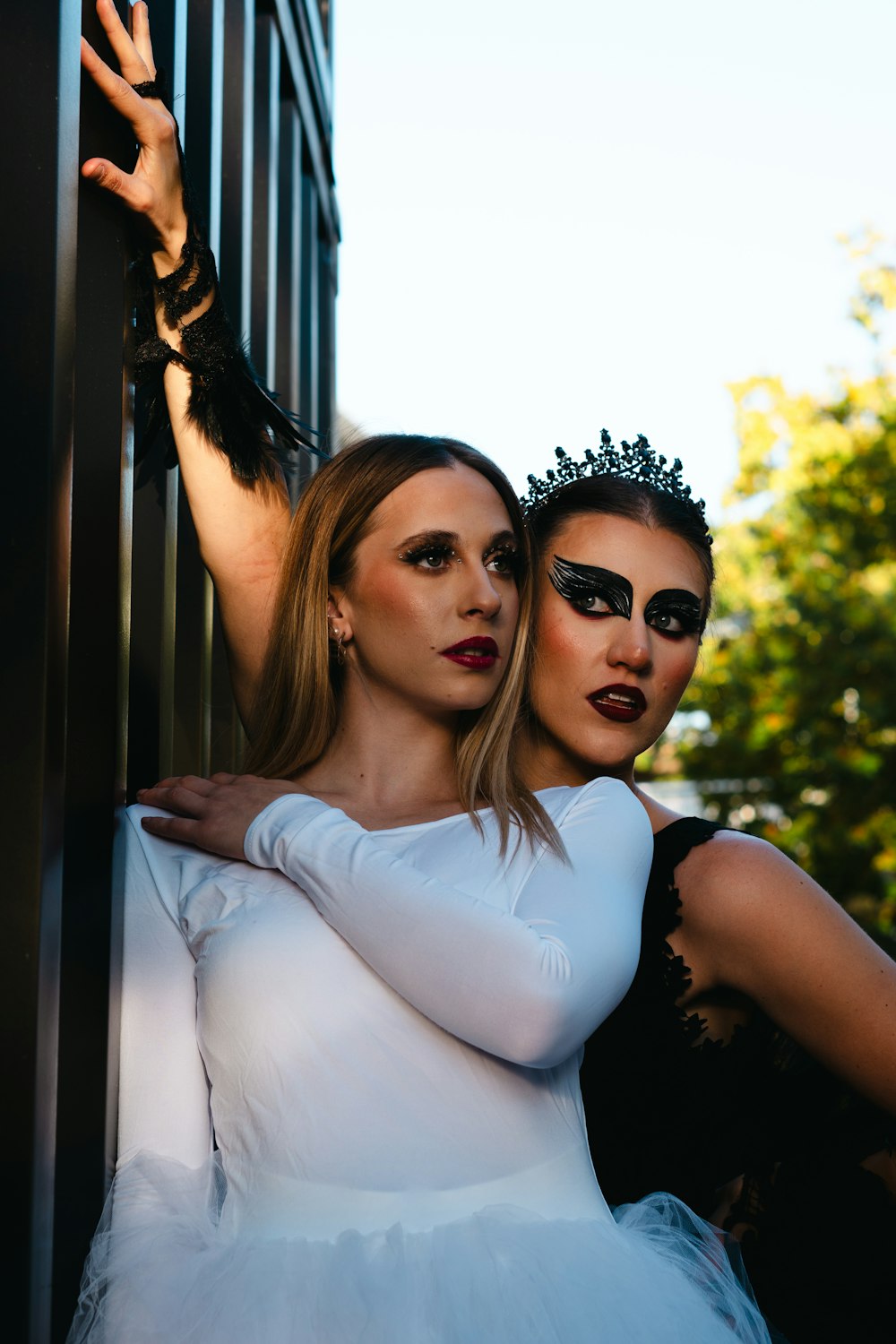 a couple of women standing next to each other