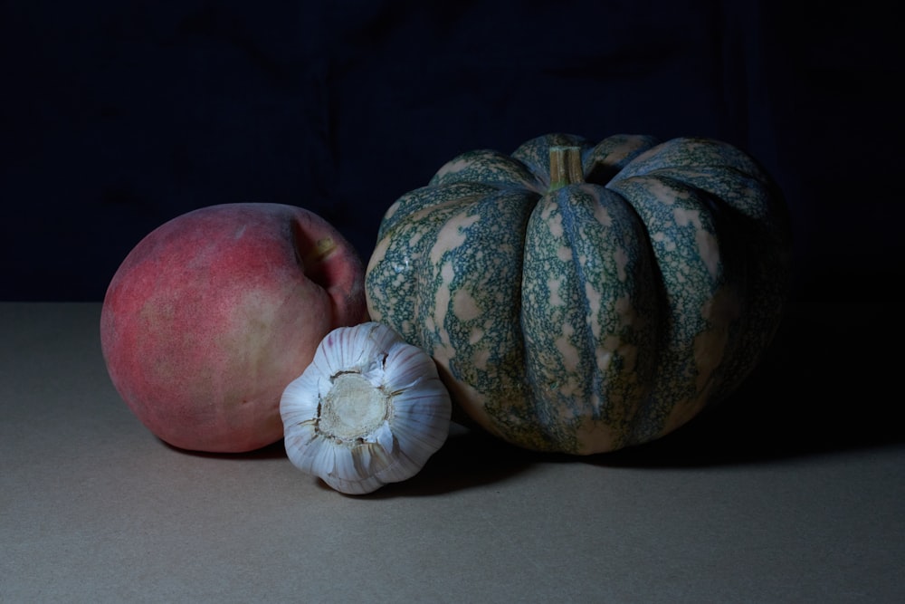 a couple of fruits and vegetables on a table