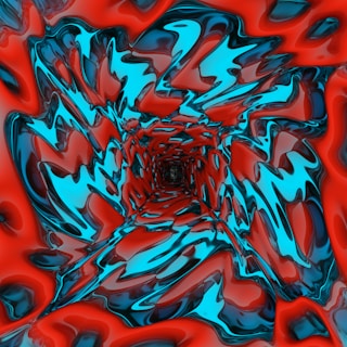 an abstract image of a red and blue flower