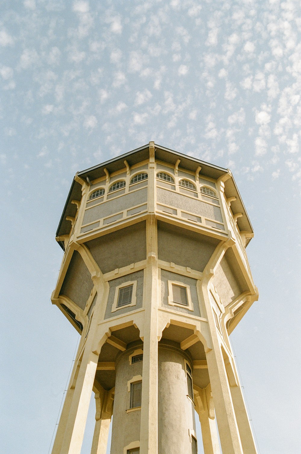 a tall tower with a clock on the top of it