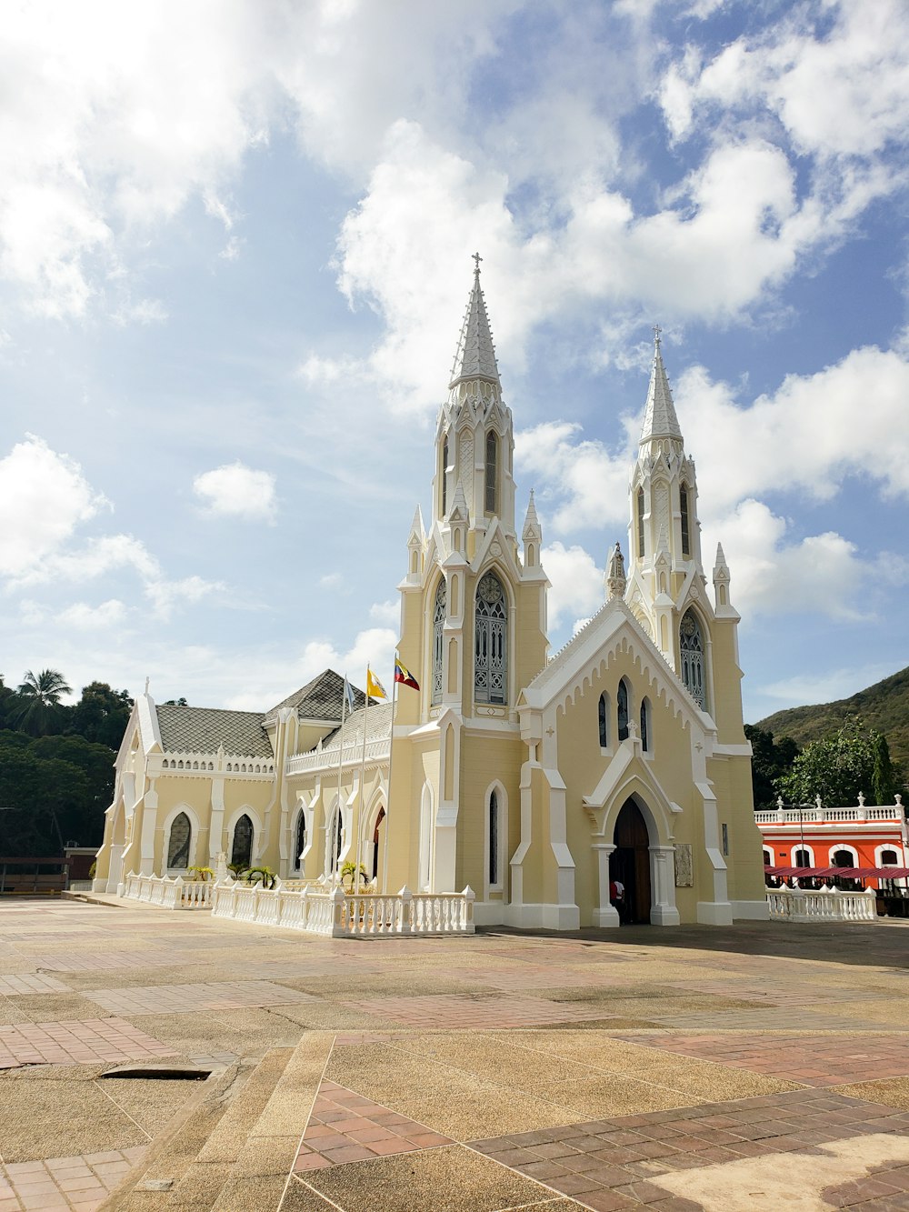 a large white church with a clock tower