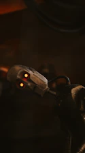 Close-up of the Hypershell exoskeleton’s mechanical joints glowing subtly against a dark background.
