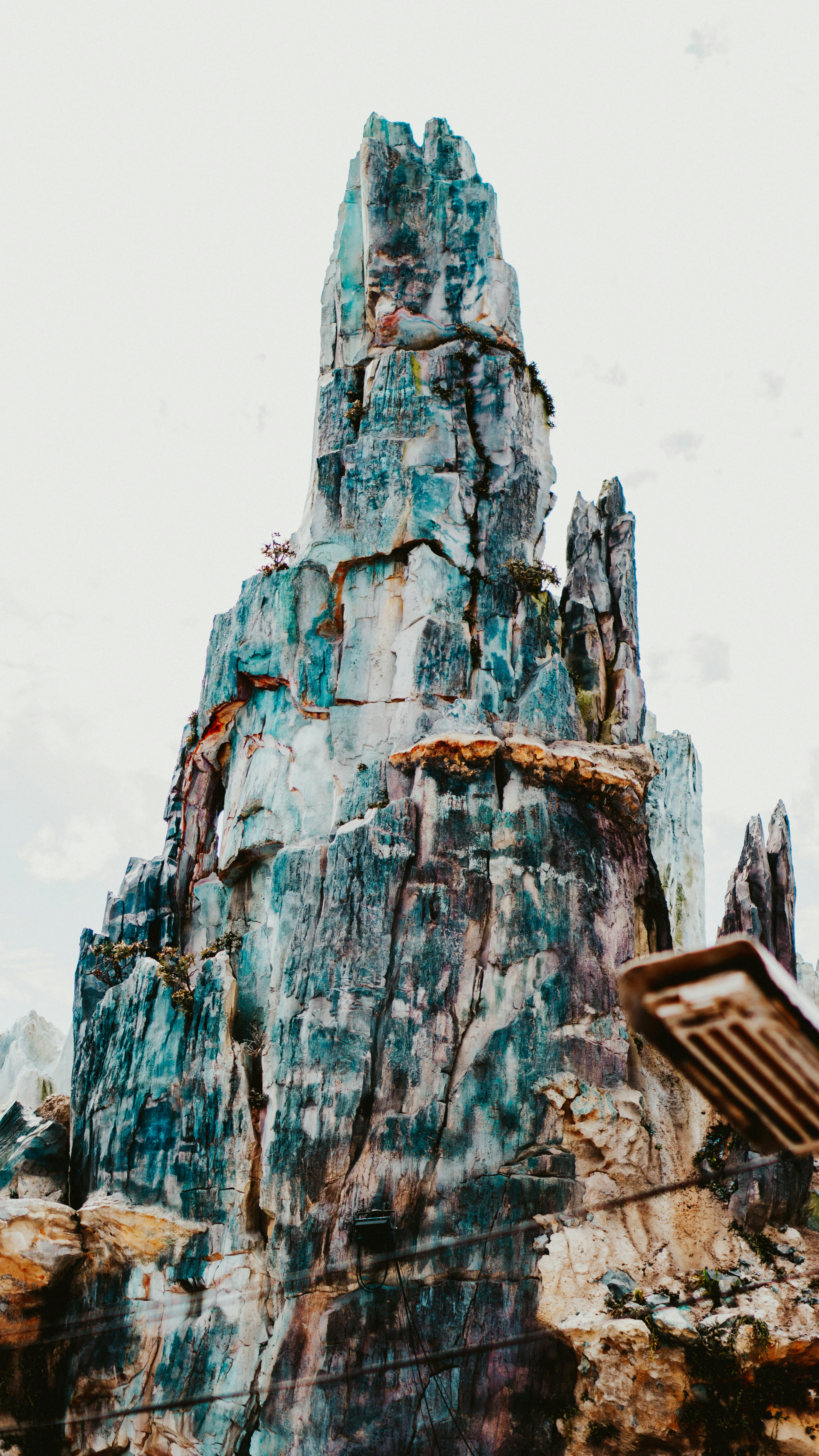 A large rock formation with a sky background photo – Free Disney's ...