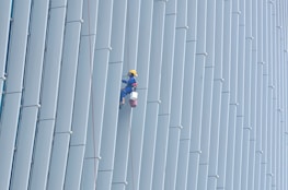 A professional handyman performing maintenance work on a property.