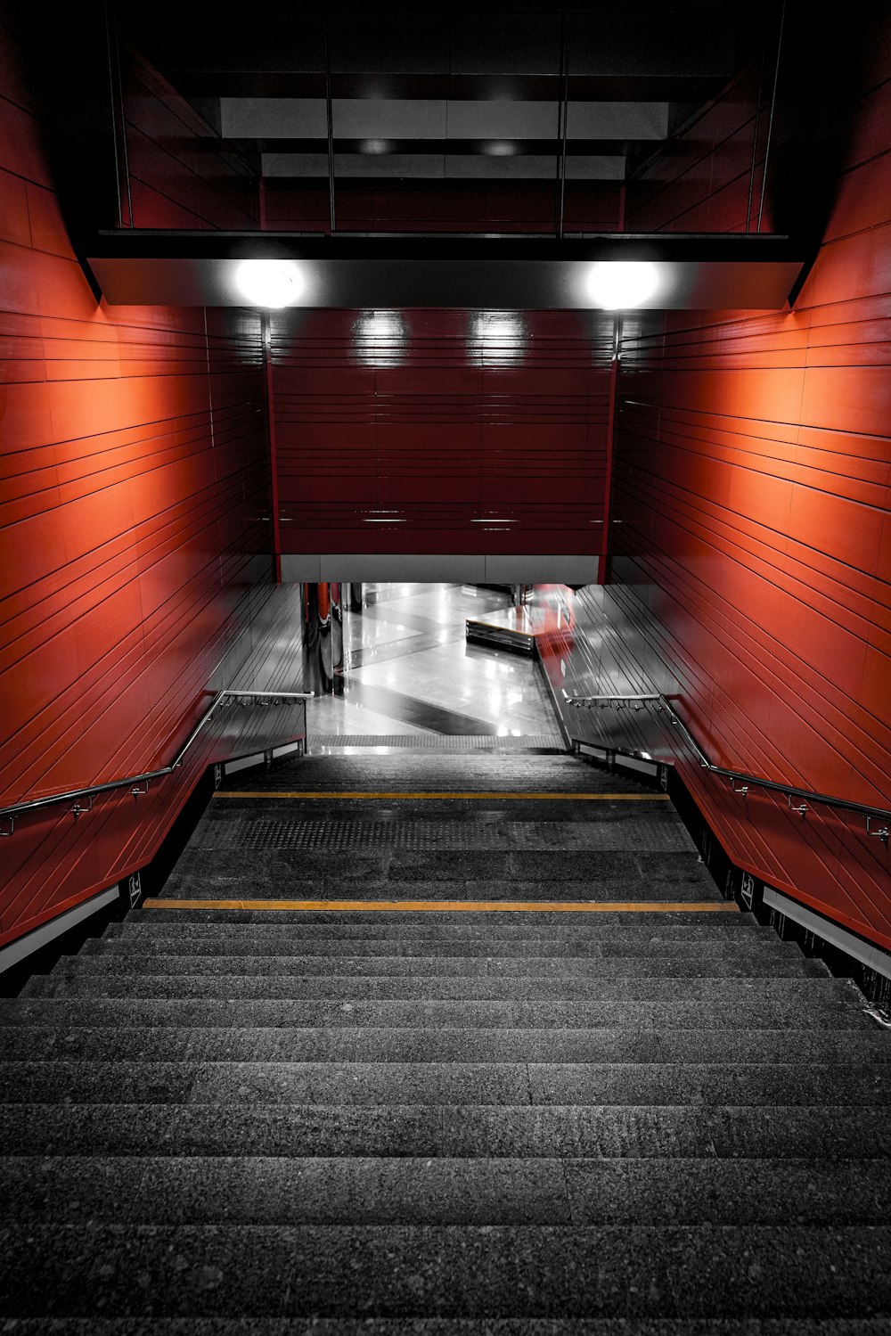 a set of stairs leading up to a red door