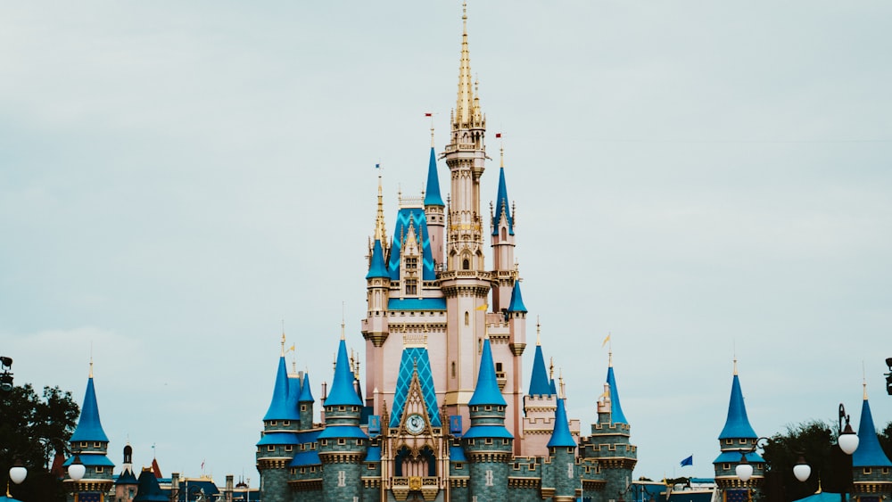 a large castle with a clock on it's side