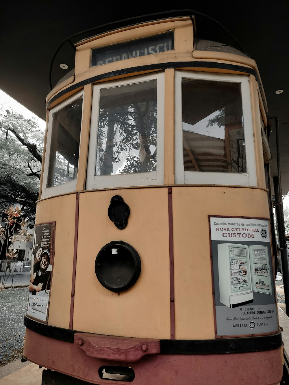 a trolley car sitting on the side of the road