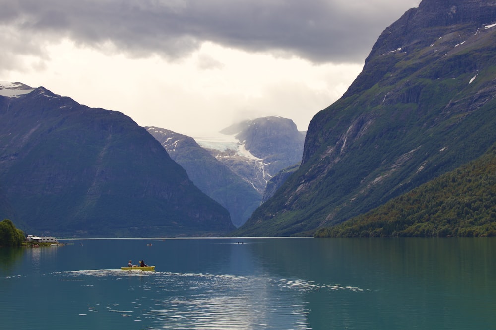 a small boat in a large body of water