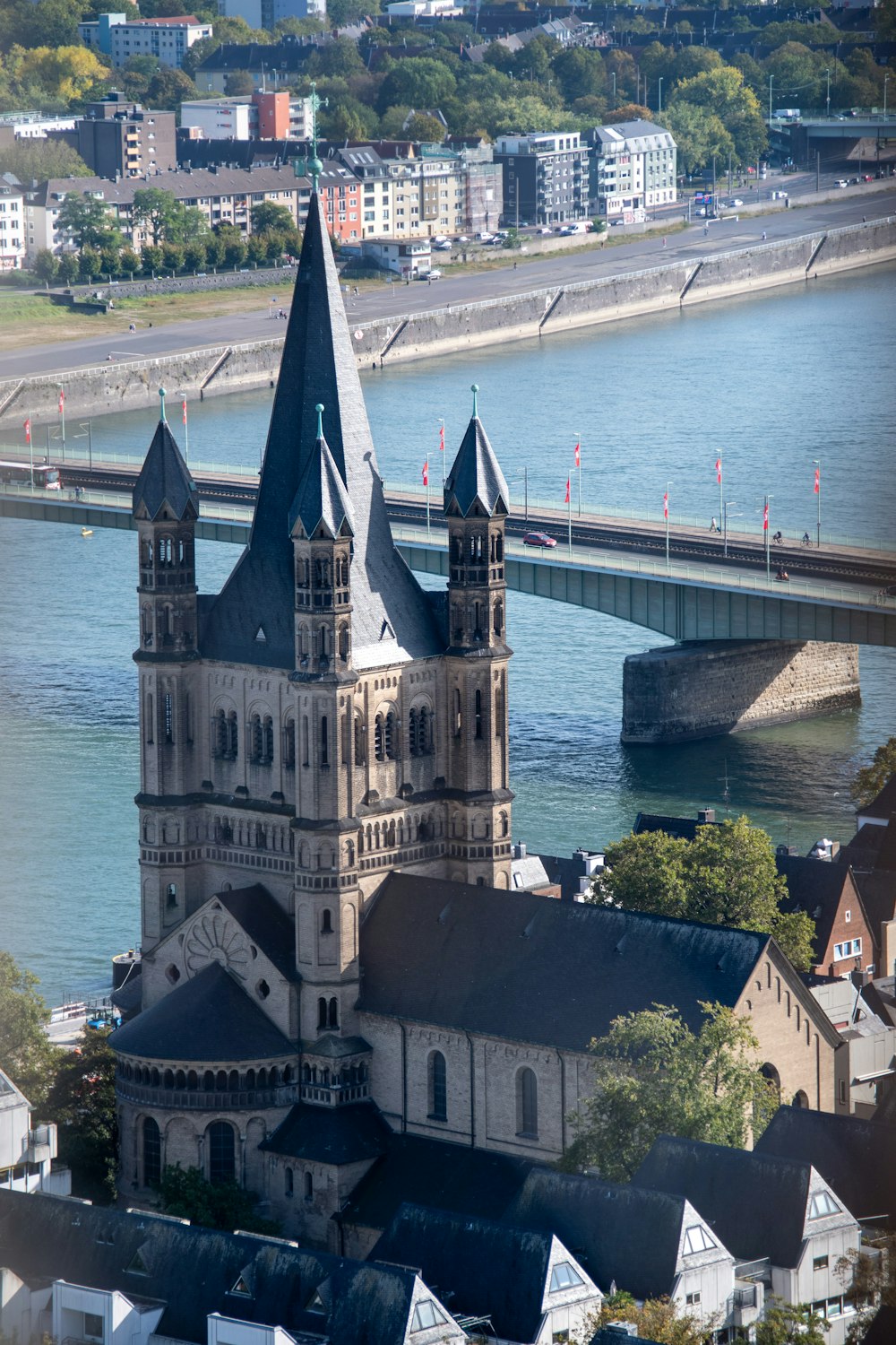 a large cathedral with a bridge in the background