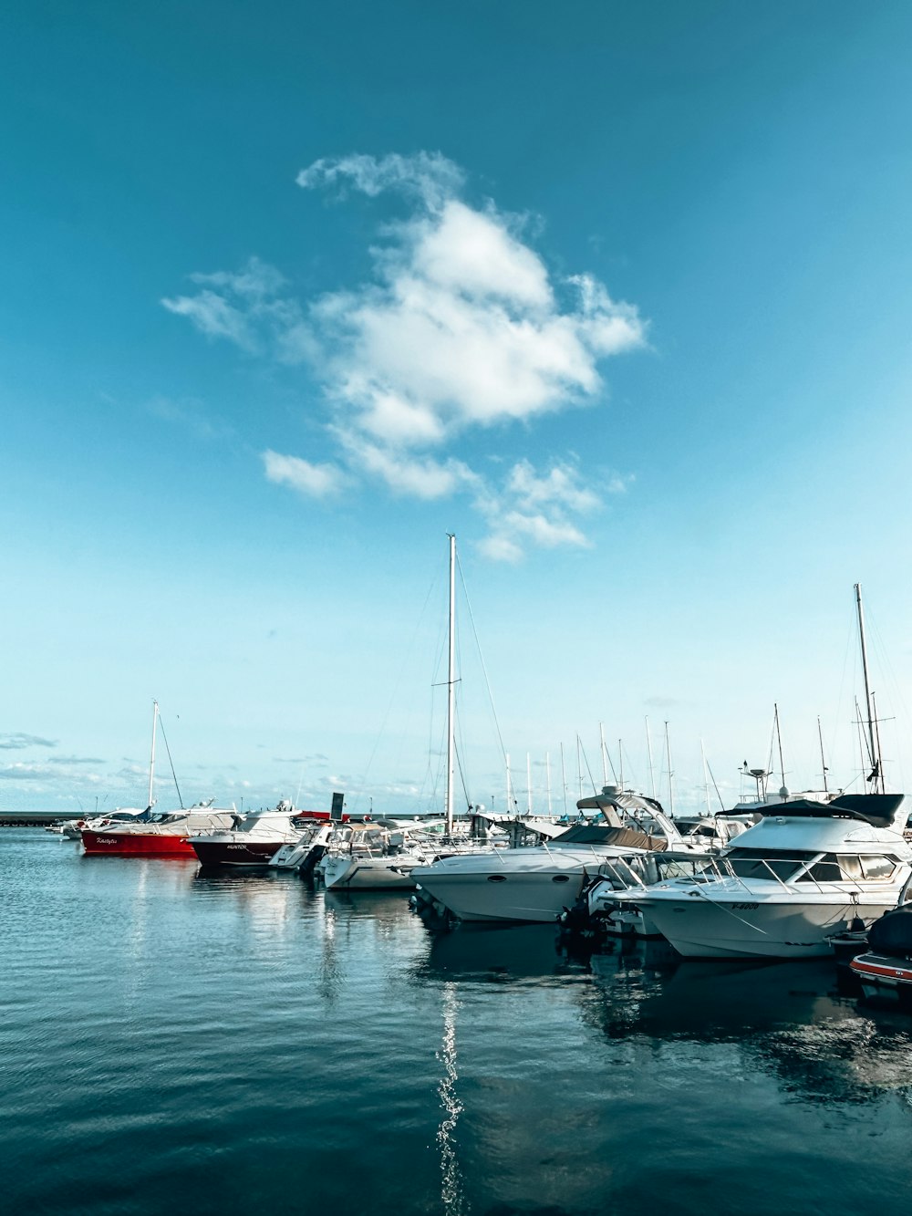 a bunch of boats that are in the water