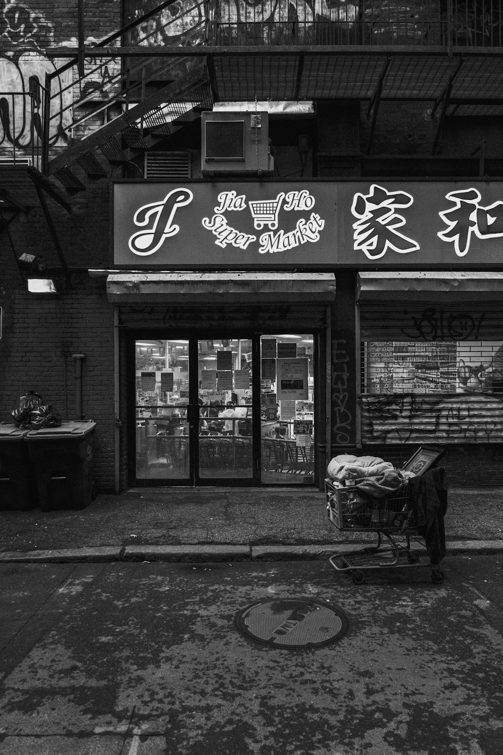 a black and white photo of a store front