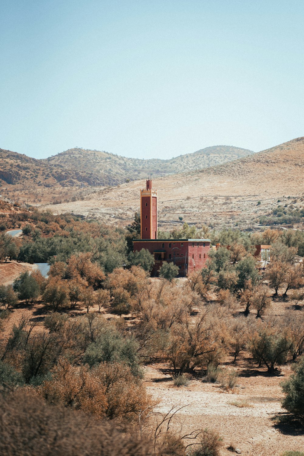 a building in the middle of a desert