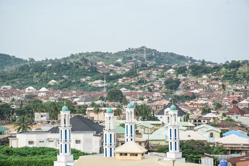 a view of a city with a hill in the background