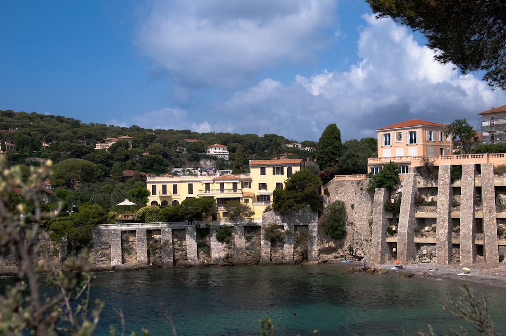 a building on a cliff overlooking a body of water