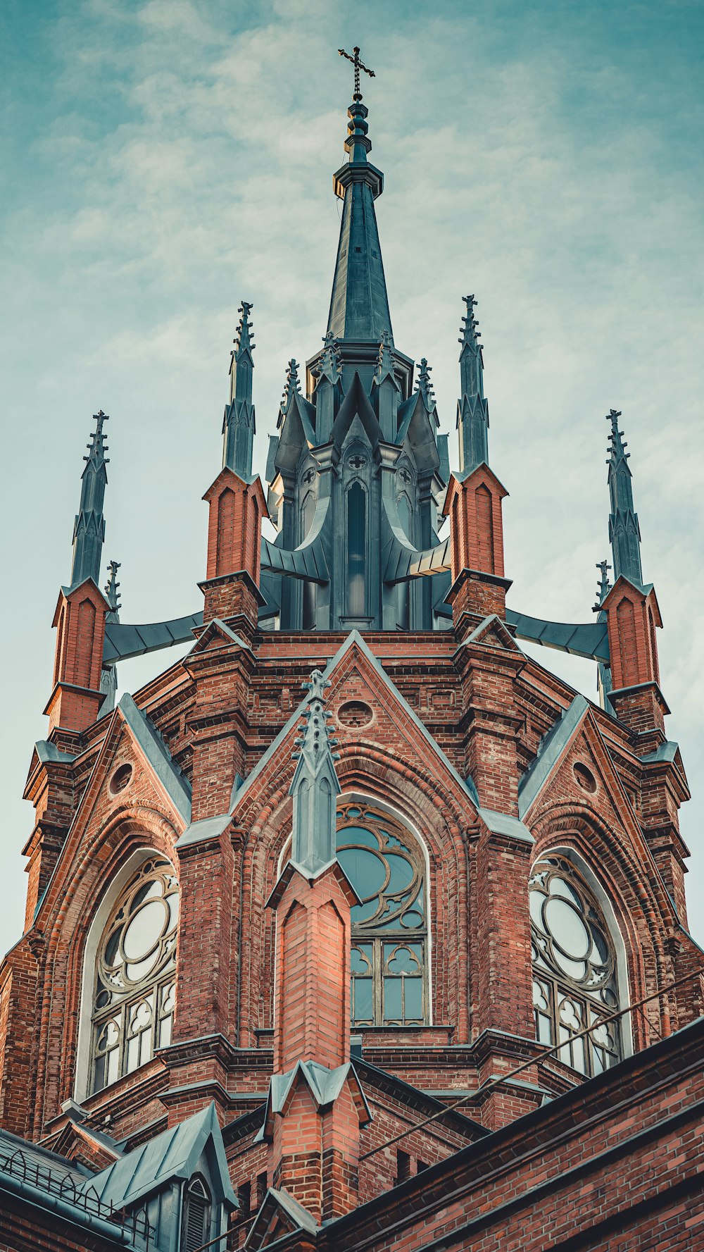 a very tall building with a clock on it's side