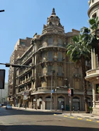 a large building with a clock on the top of it