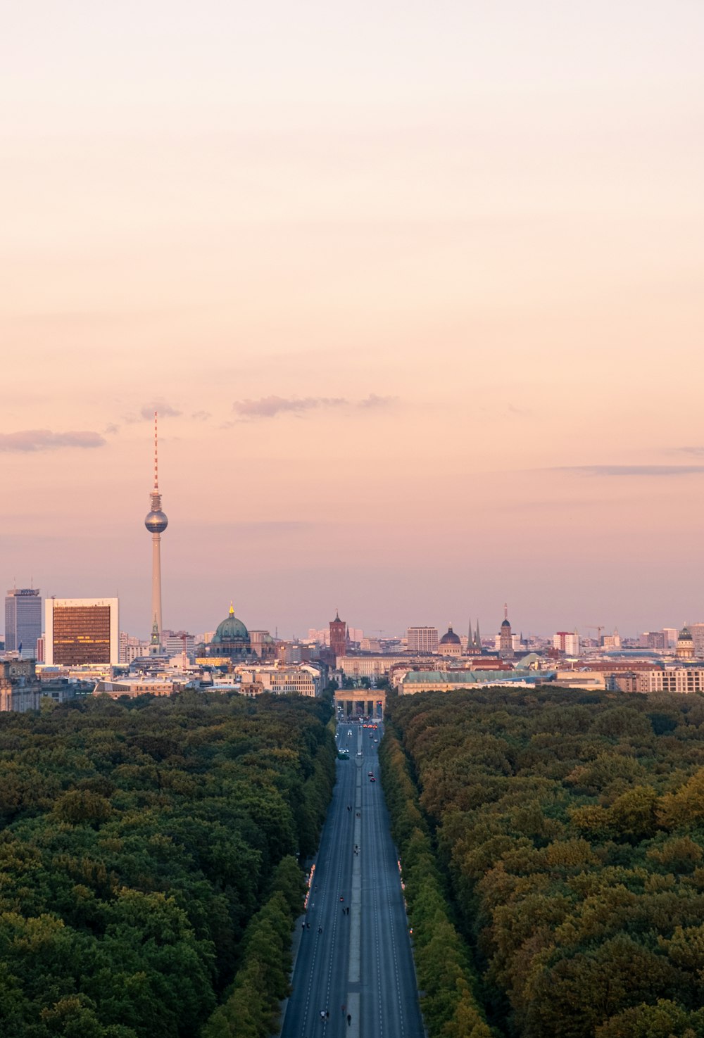 a view of a city from the top of a hill