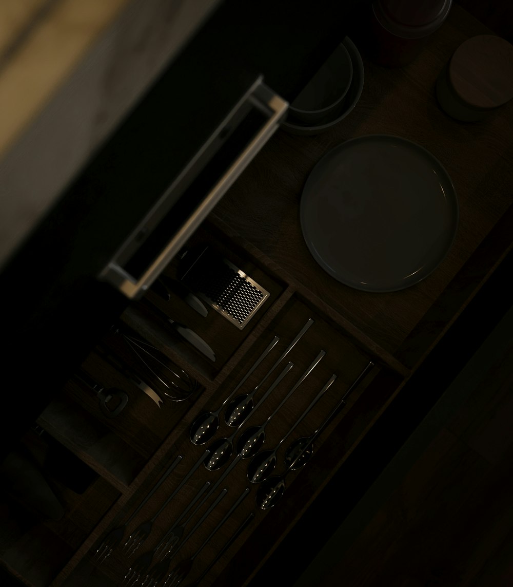 an overhead view of a kitchen counter with utensils