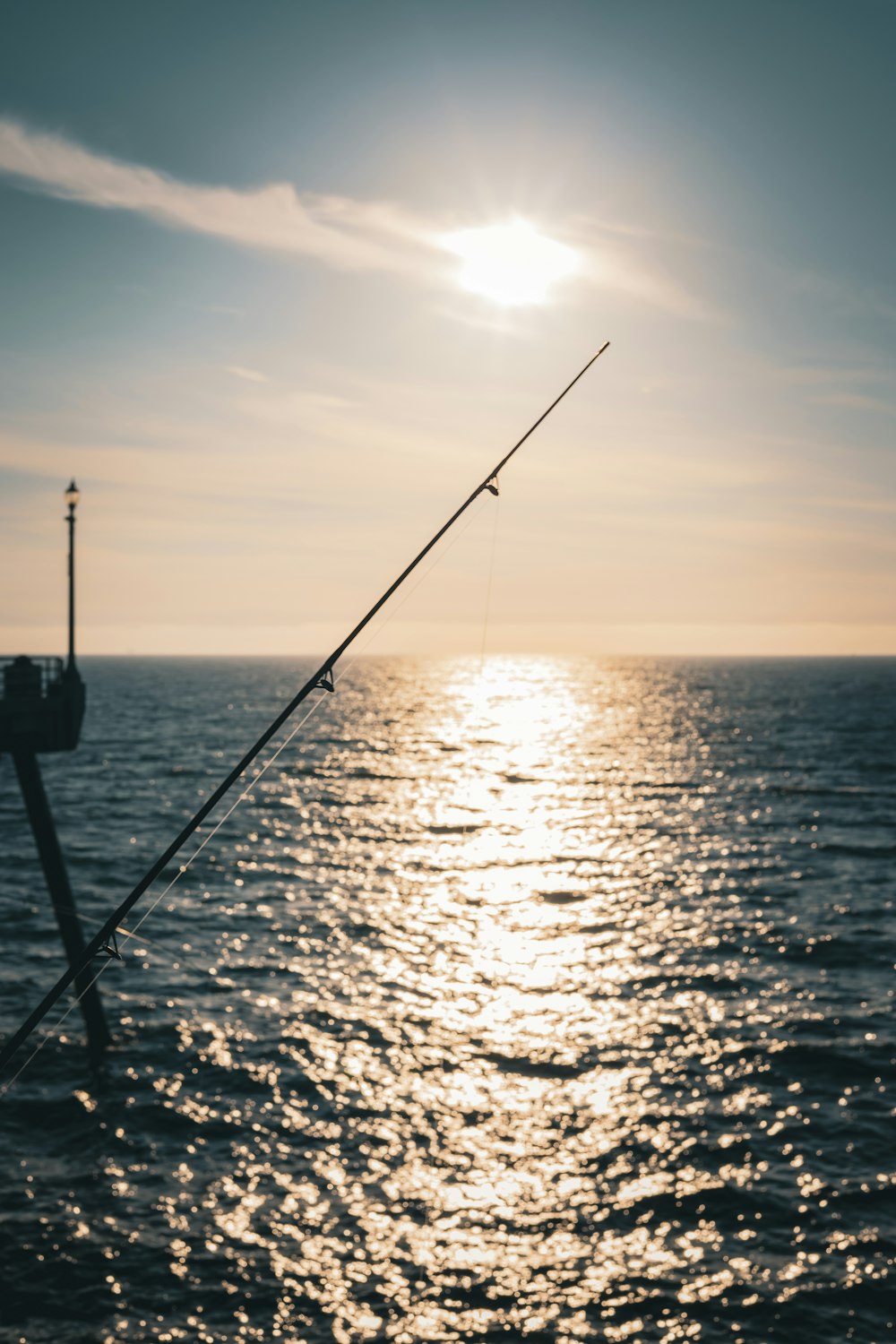 a fishing rod on a boat in the ocean