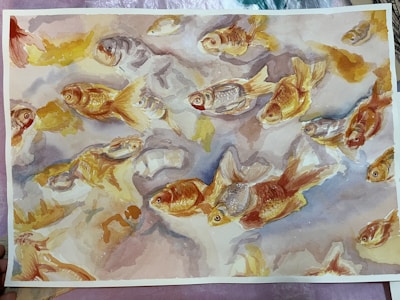 Watercolor painting of numerous goldfish swimming gracefully in different directions. Their scales glisten in hues of gold, orange, and red, with delicate brush strokes capturing the fluidity of their movement against a pale, abstract background.