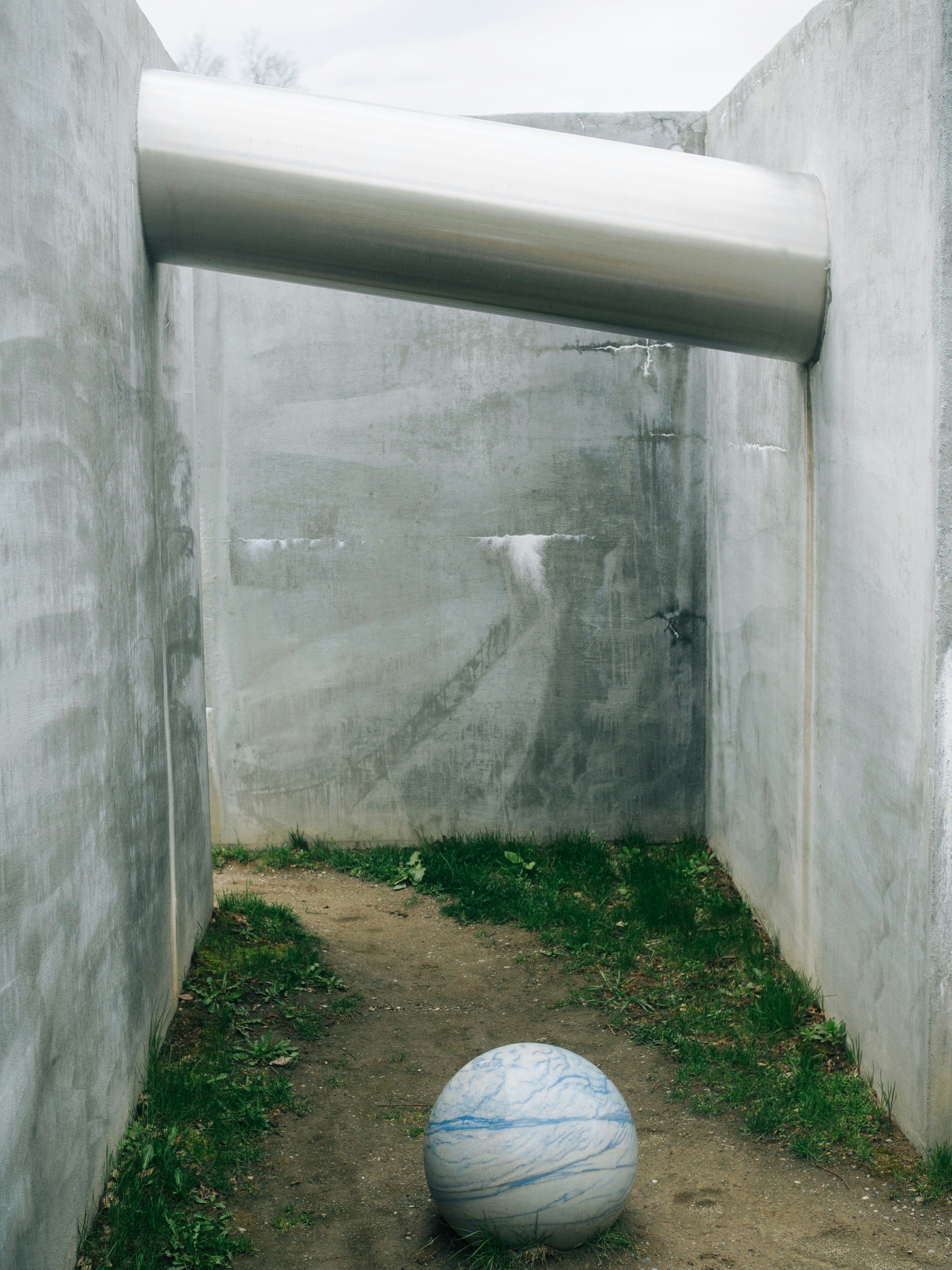 a ball sitting in the middle of a room