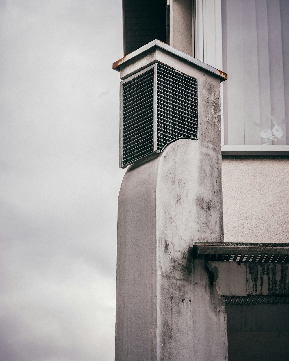 a tall building with a clock on the top of it