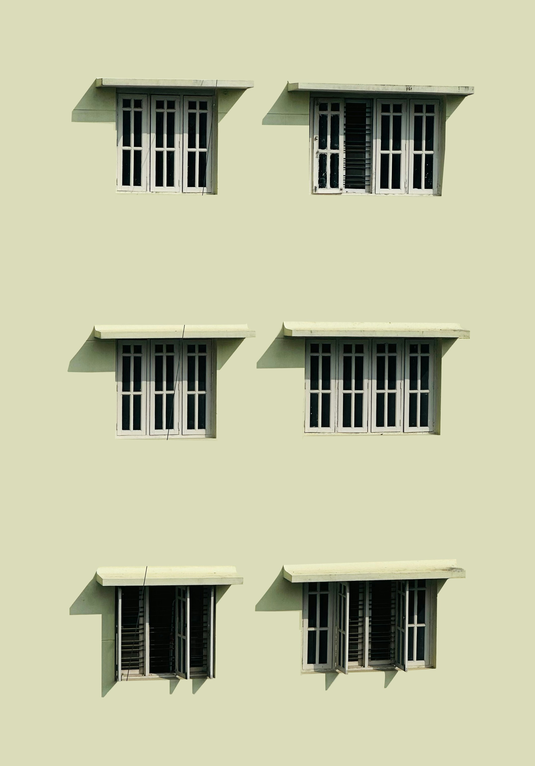 four windows with shutters on each of them