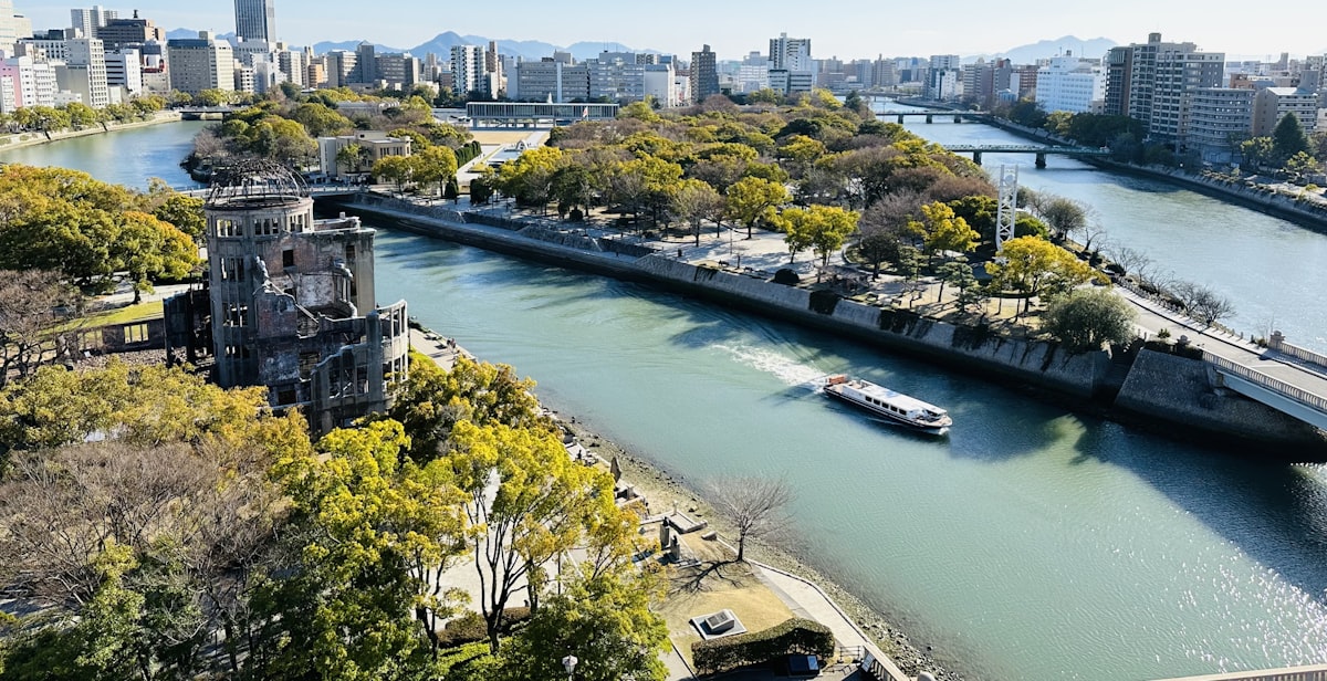 Hiroshima May — Motoyasu River and A-Bomb Dome in warm green city