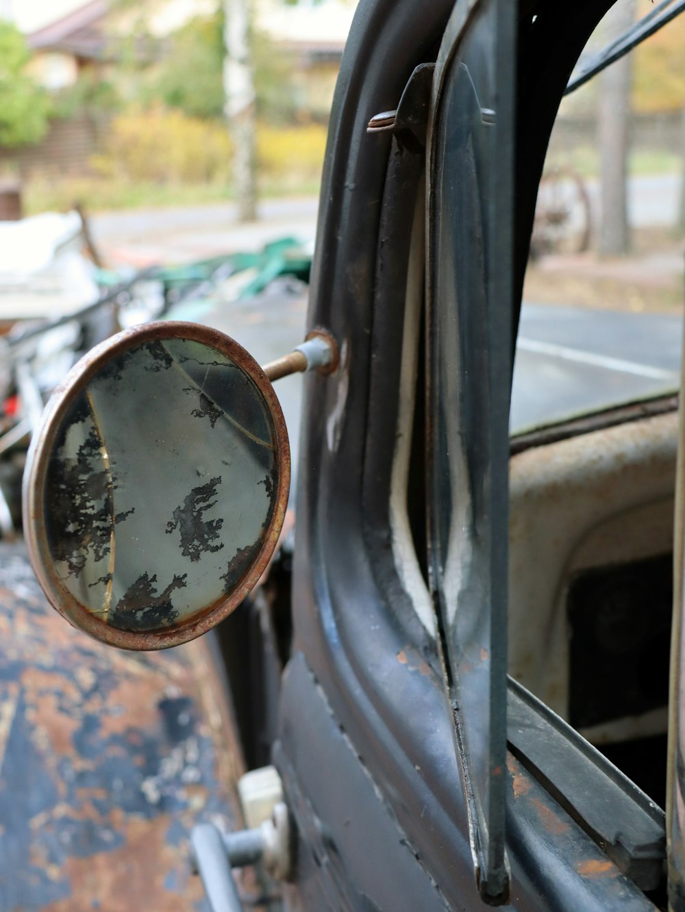 a mirror that is on the side of a truck