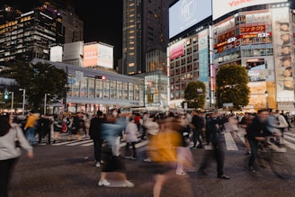 360-imagery of a bustling city street filled with people and activity.
