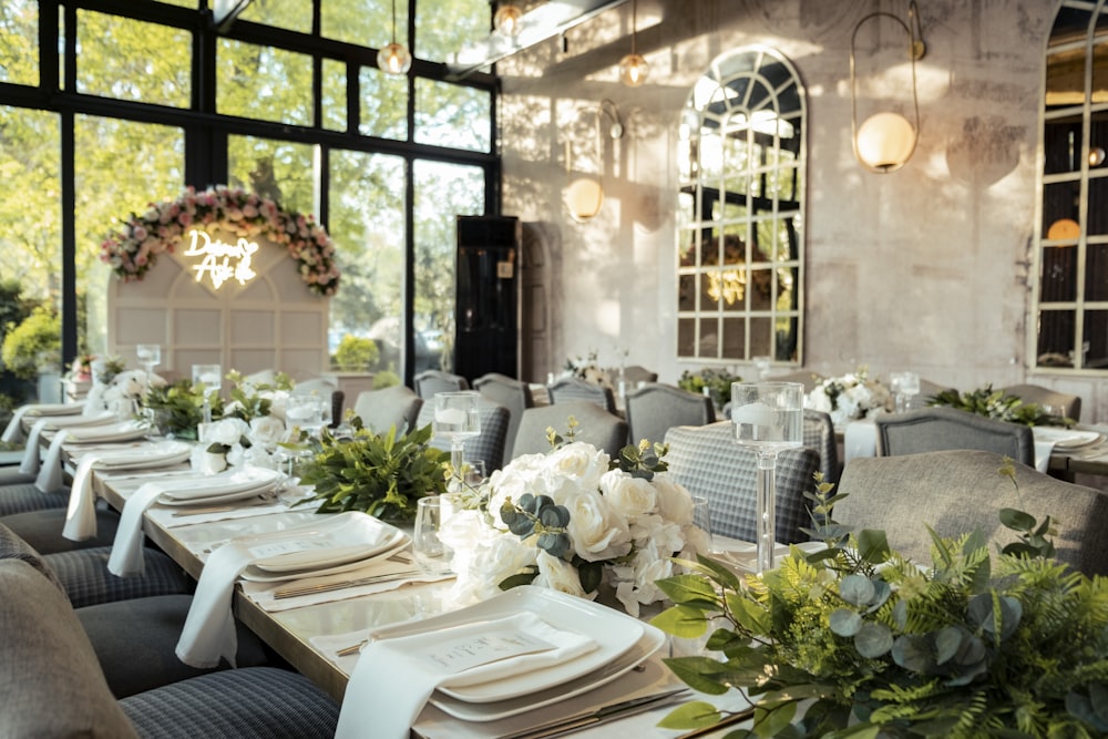 a table set for a formal dinner in a restaurant