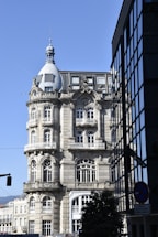 a tall building with a clock on the top of it
