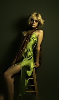 A stylish Russian call girl in Ludhiana, captured in a candid moment at a cozy lounge.