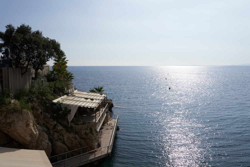 a house on a cliff overlooking the ocean