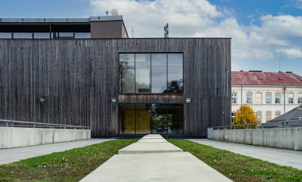 a building that has a walkway in front of it