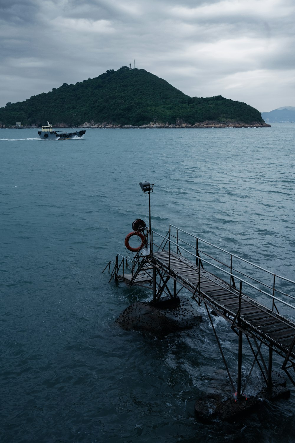 a boat traveling across a large body of water