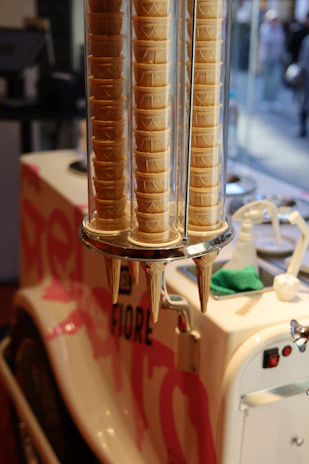 Nutriice protein ice cream cups stacked neatly with branded packaging visible