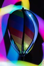 The friendly tazik mascot surrounded by sparkling stars and neon cosmic trails.