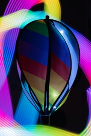 The friendly tazik mascot surrounded by sparkling stars and neon cosmic trails.