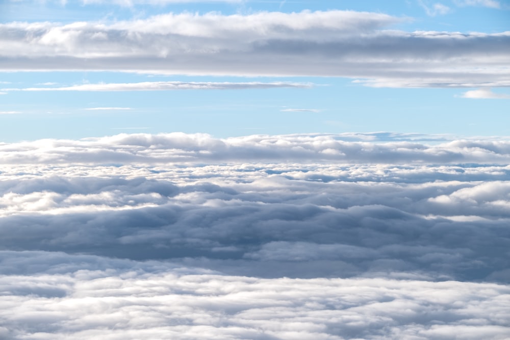 a view of clouds from an airplane window