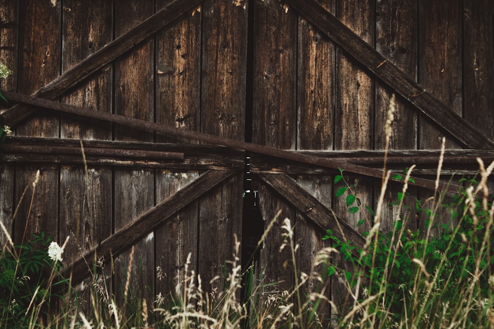 an old barn door with a wooden frame