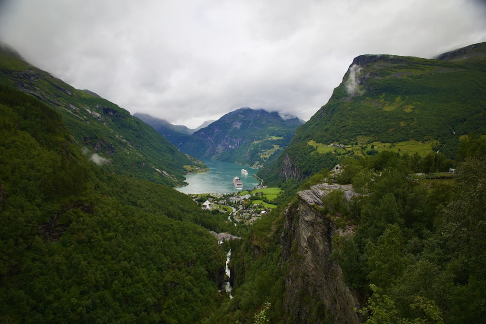 a scenic view of a valley with a river running through it